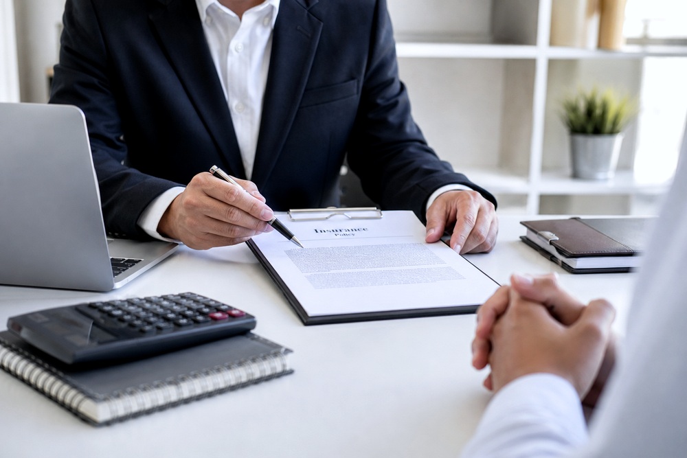 Insurance paperwork and coverage review workspace